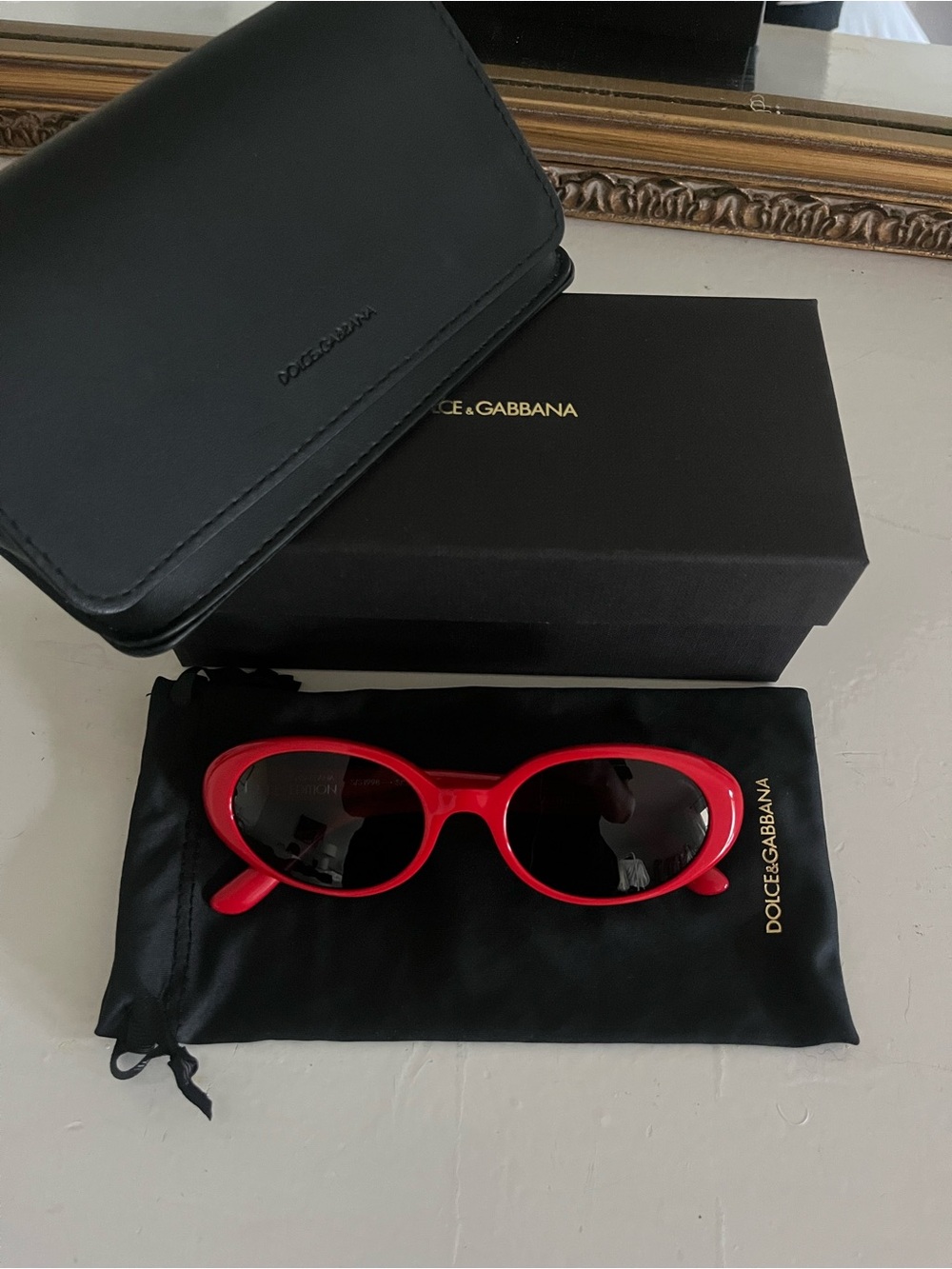Dolce & Gabbana Red Oval Frame Sunglasses with Black Lenses